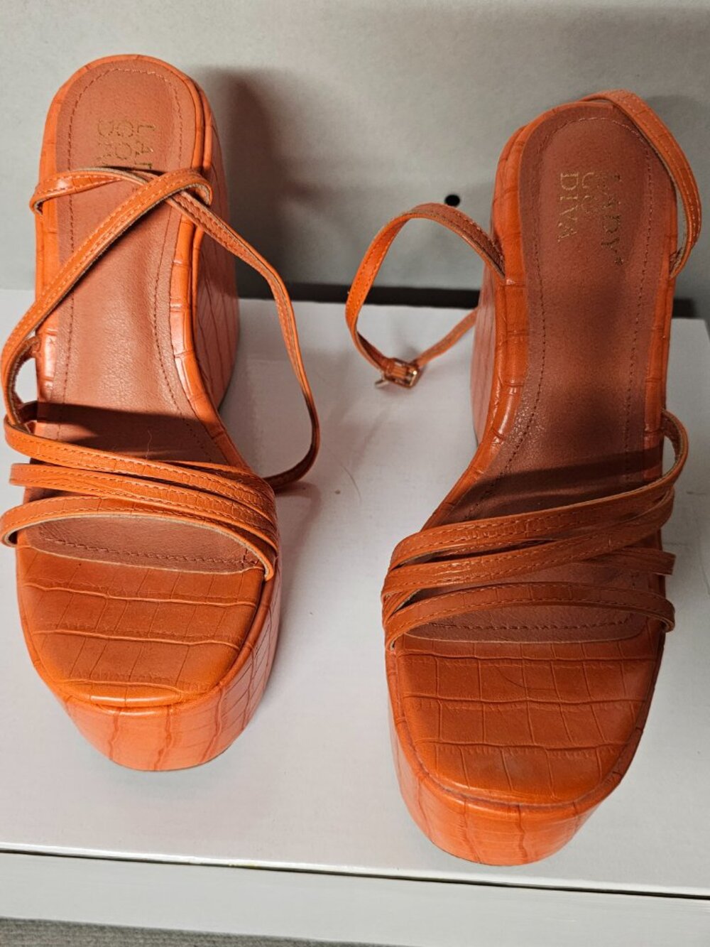 Orange strappy sandals